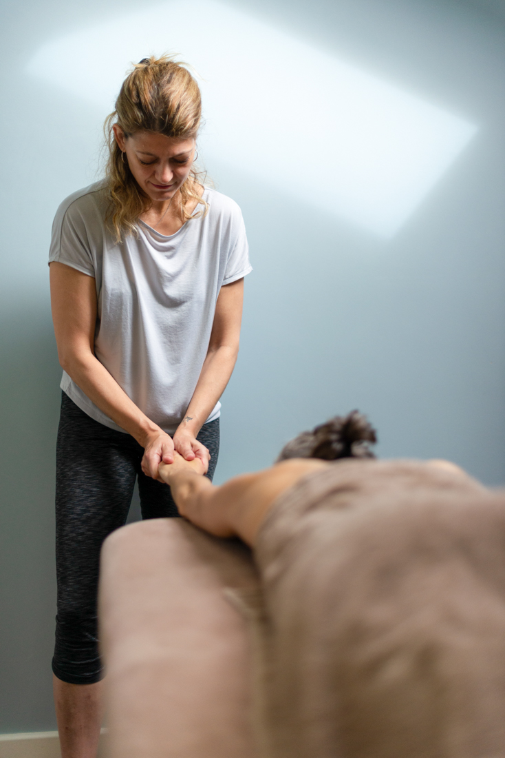 Massage therapist Ioanna in action, enhancing wellness at Narro Studio.