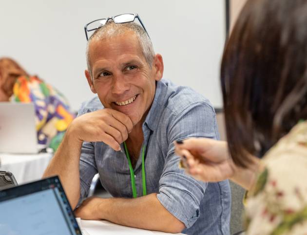 Participant smiling at a London workshop in a photograph by Narrō Studio